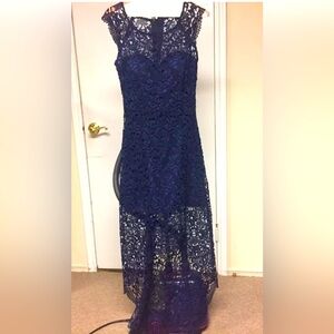 women's woven dress with a slanting skirt. Lace dress.